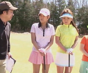 Asian teen girls plays golf..